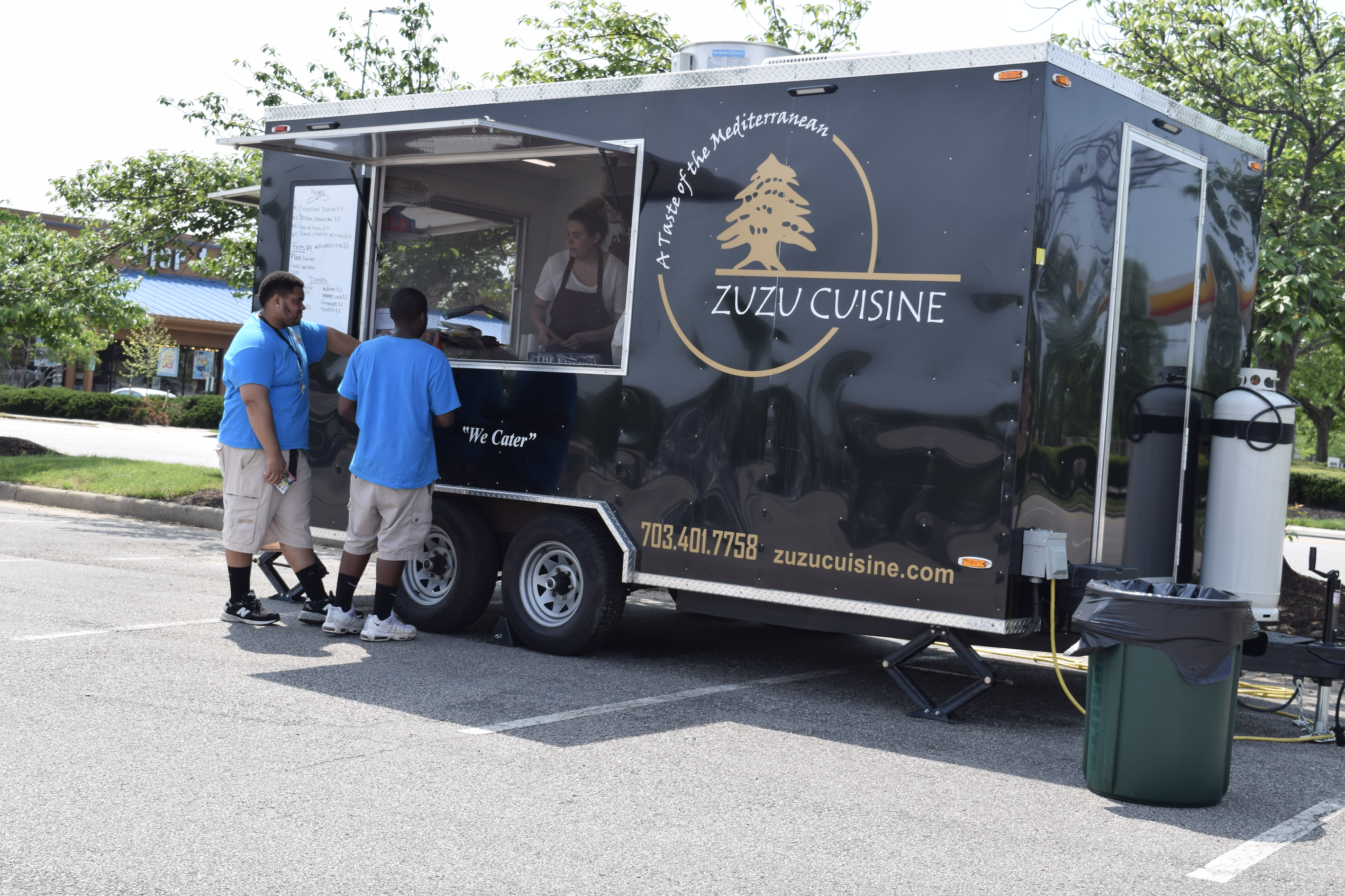 Zuzu Cuisine Food truck at "The Market at Potomac Mills" farmers market in Woodbridge, Virginia