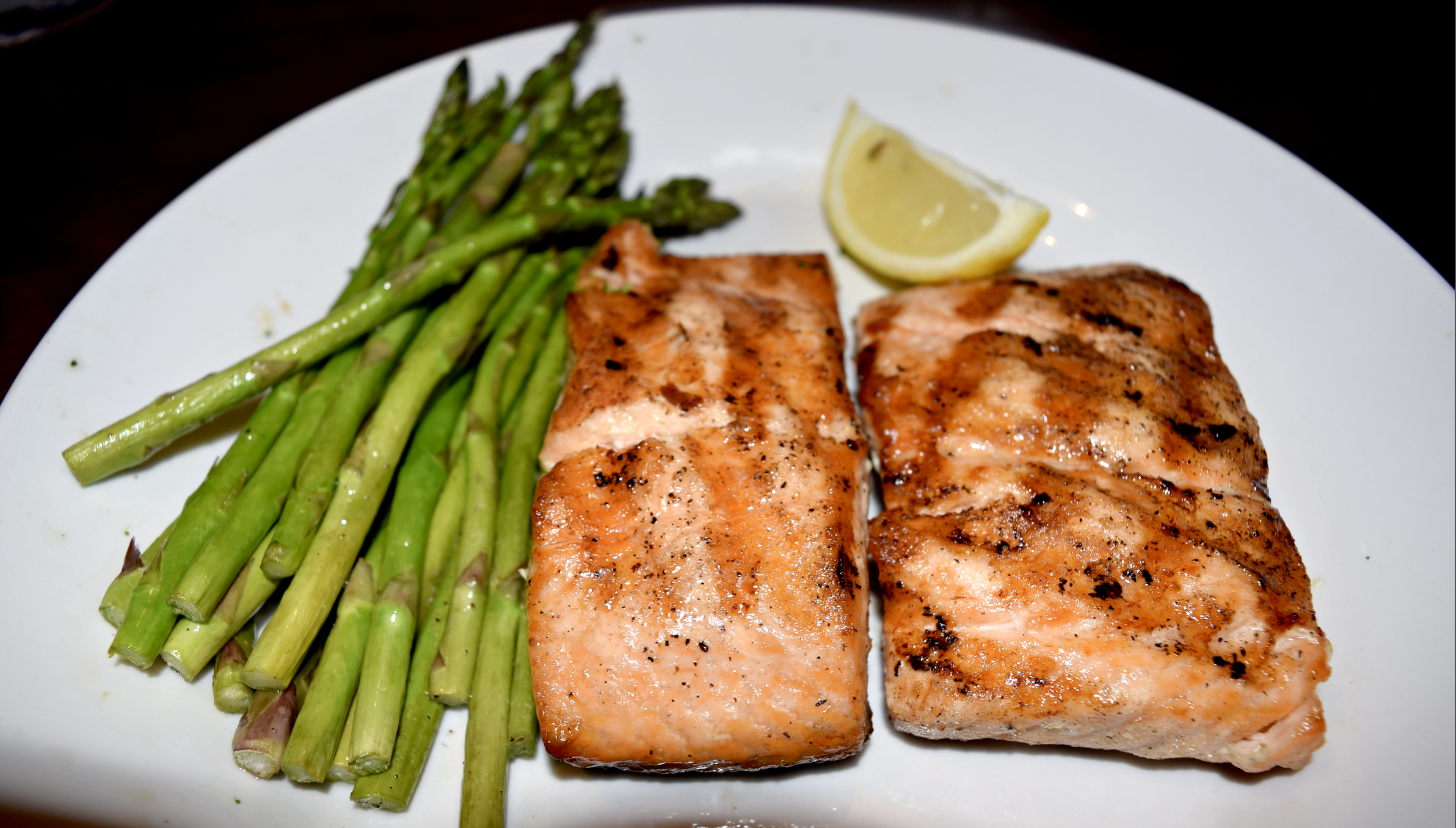 Blackened salmon with grilled asparagus and mashed sweet potatoes topped with chopped pecans and melted butter @ red Lobster - Manassas, Virginia