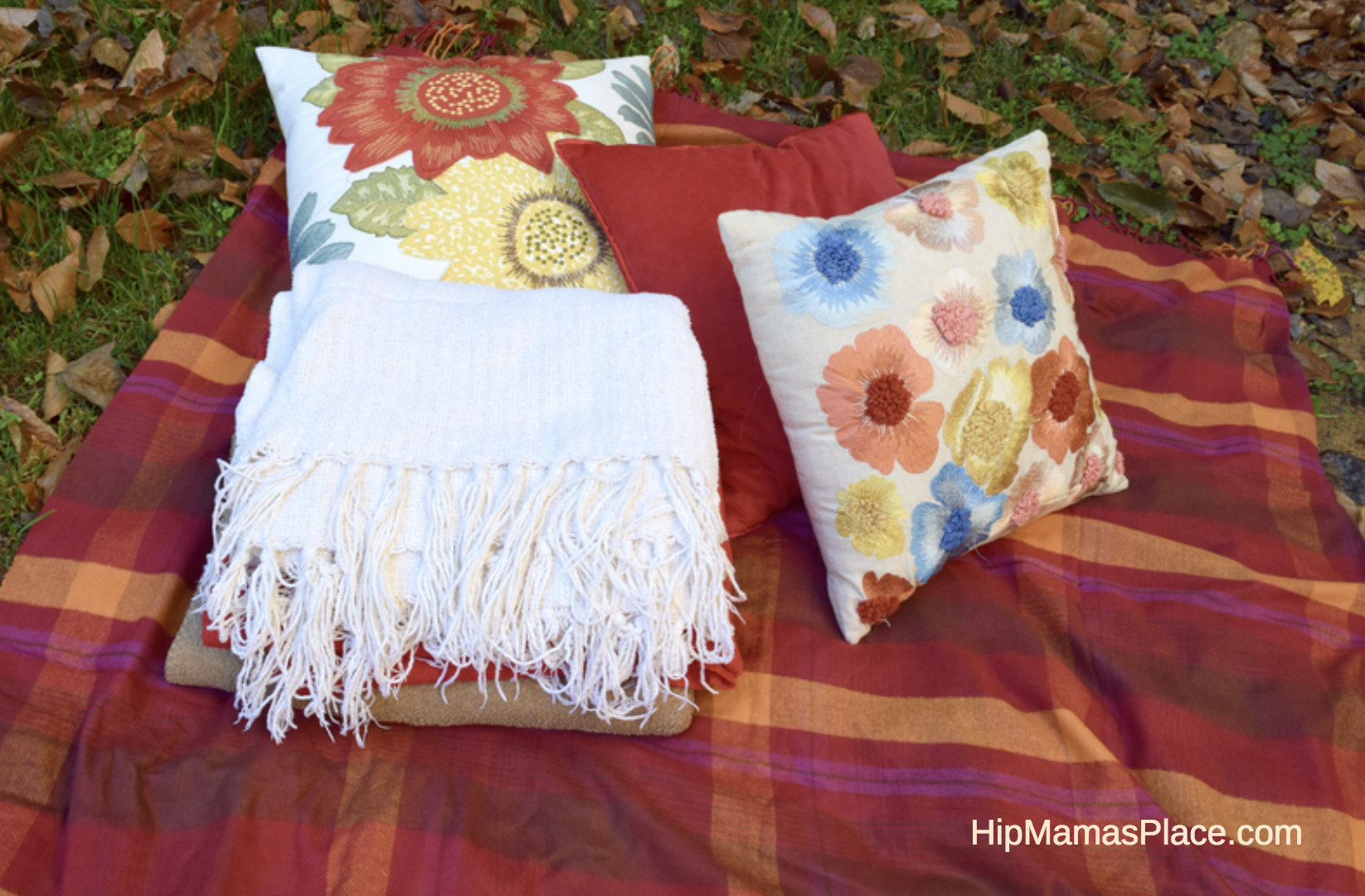For a successful and fun fall picnic, toss blankets and floor pillows on the ground to create nesting spots.
