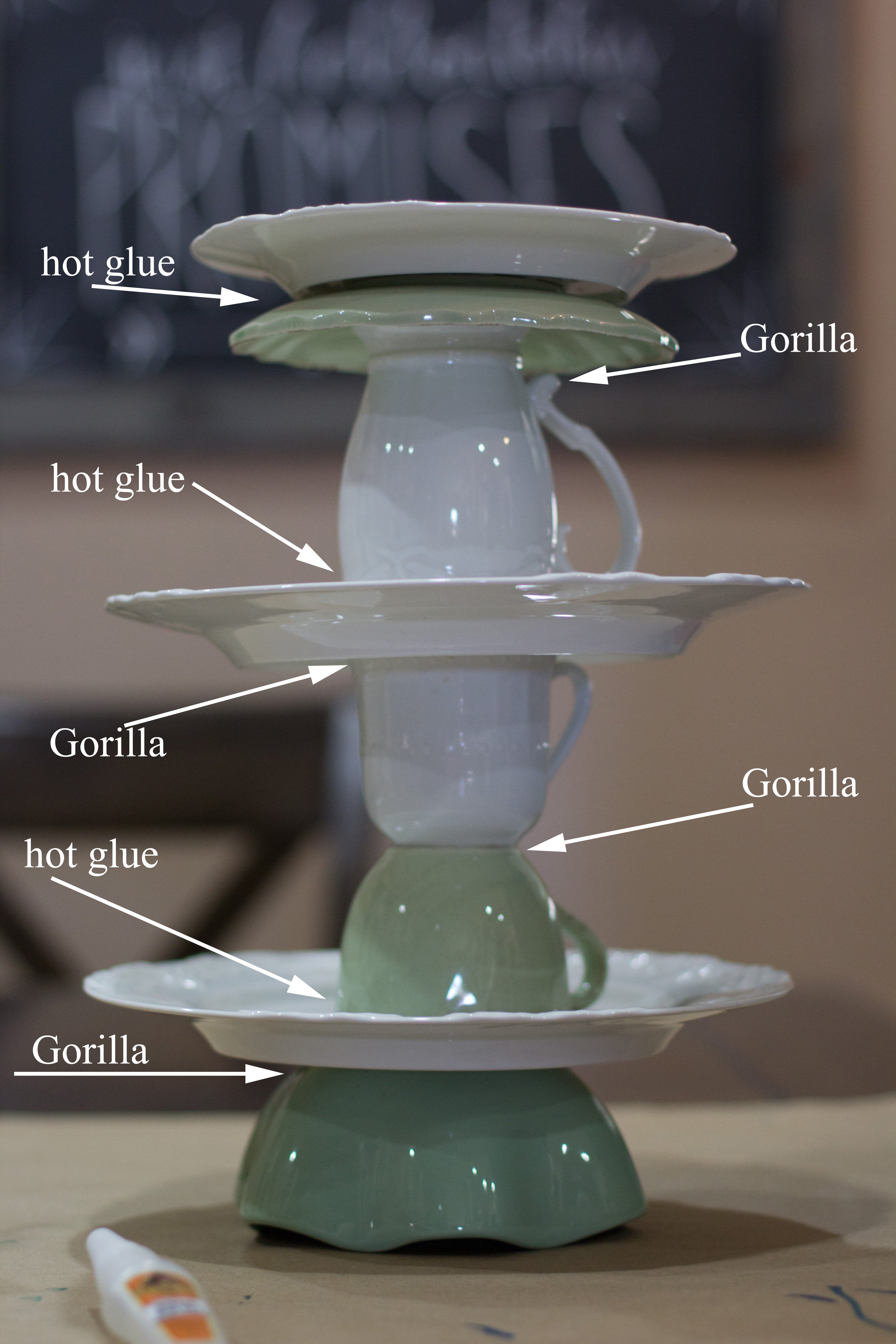  Here’s a lovely DIY upcycled tiered cake stand that I made out of coordinating plates, bowls and coffee cups from the thrift store!