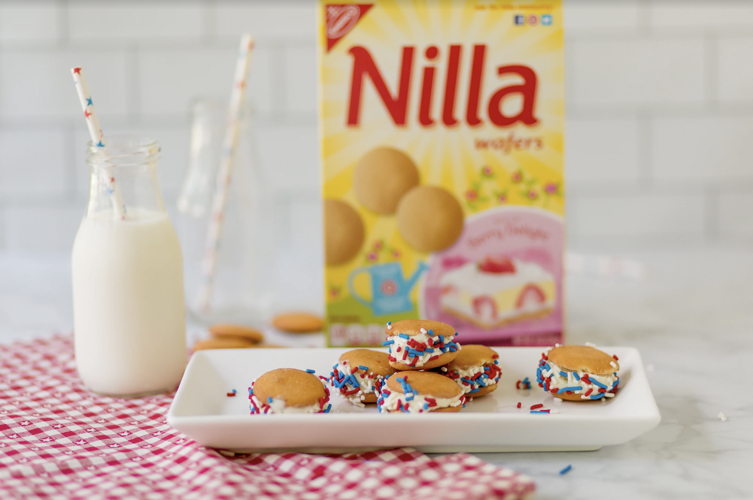 Patriotic, delicious and refreshing, these Red, White and Blue Mini Ice Cream Sandwiches with NILLA Wafers are the perfect summer snacks or desserts for your next summer party!