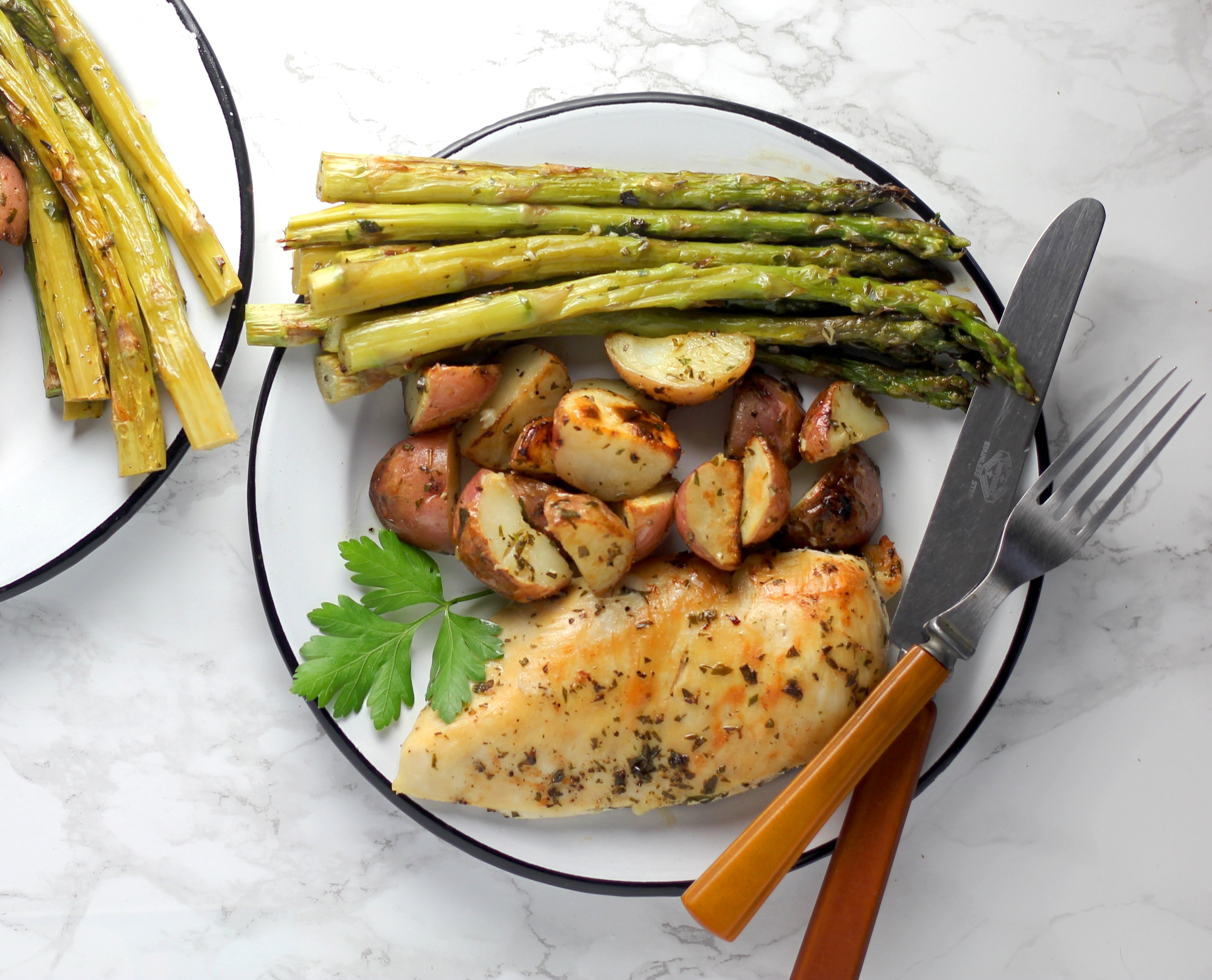 This quick and easy One-Pan Garlic Herb Butter Chicken with Potatoes and Asparagus makes a complete, satisfying dinner that’s perfect for busy weeknights!