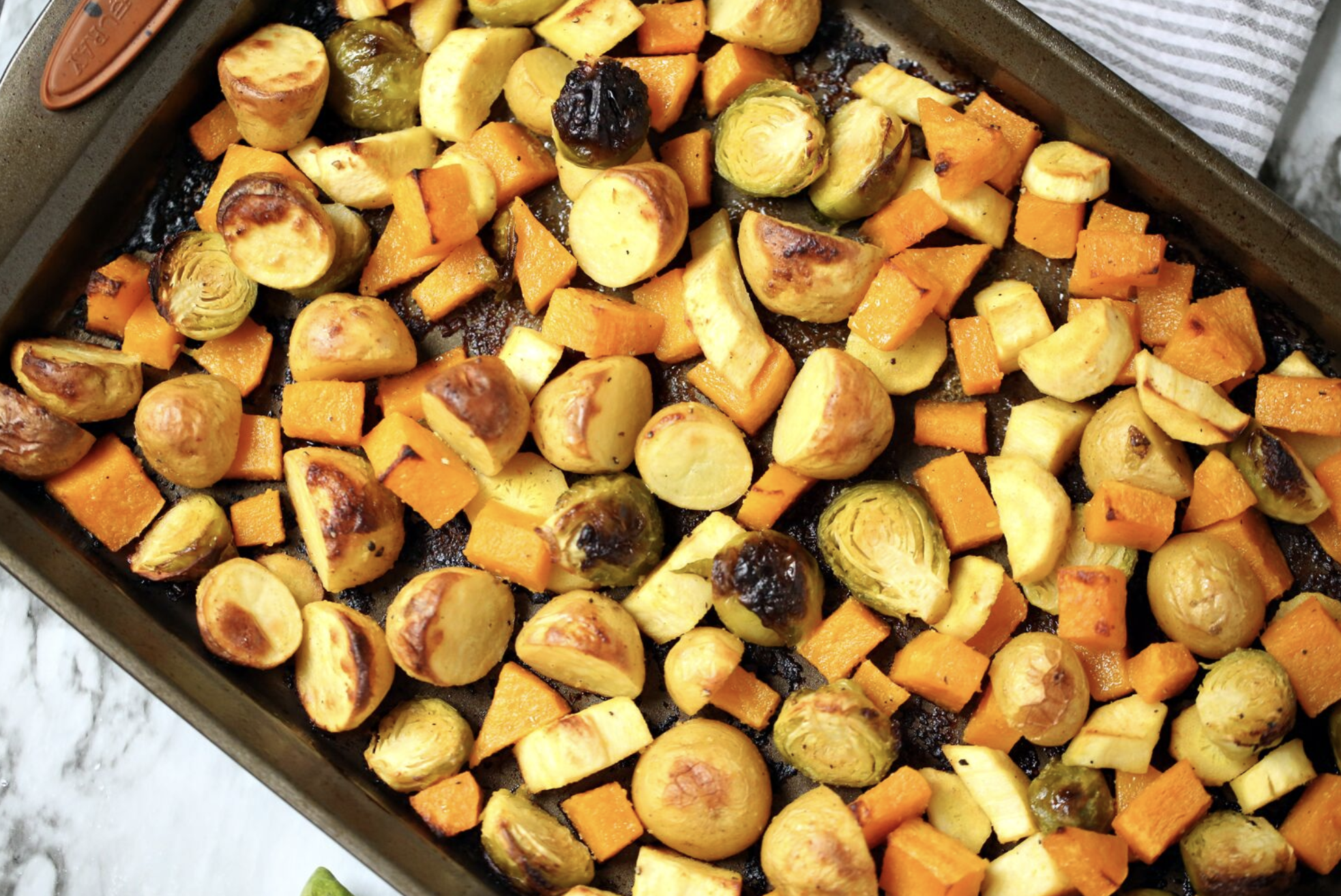 This Sheet Pan Roasted Vegetables recipe is the perfect side dish that's great any time of the year but especially in the cooler Fall and winter seasons! Get the full recipe @ www.hipmamasplace.com #ad #BetterThan #IC