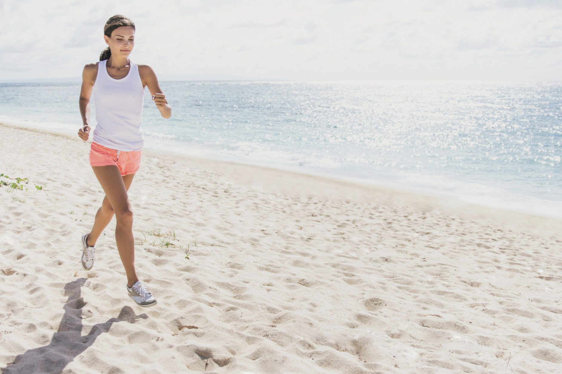 woman jogging on the beach 