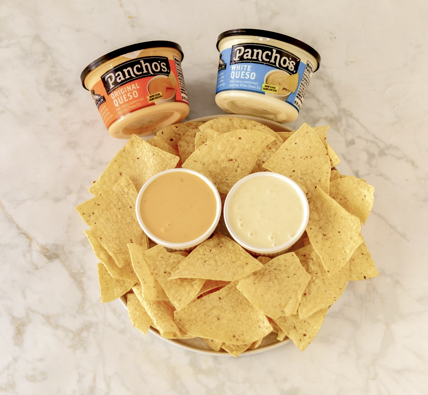 Pancho's Queso Dip in Original Queso and White Queso flavors with corn tortillas