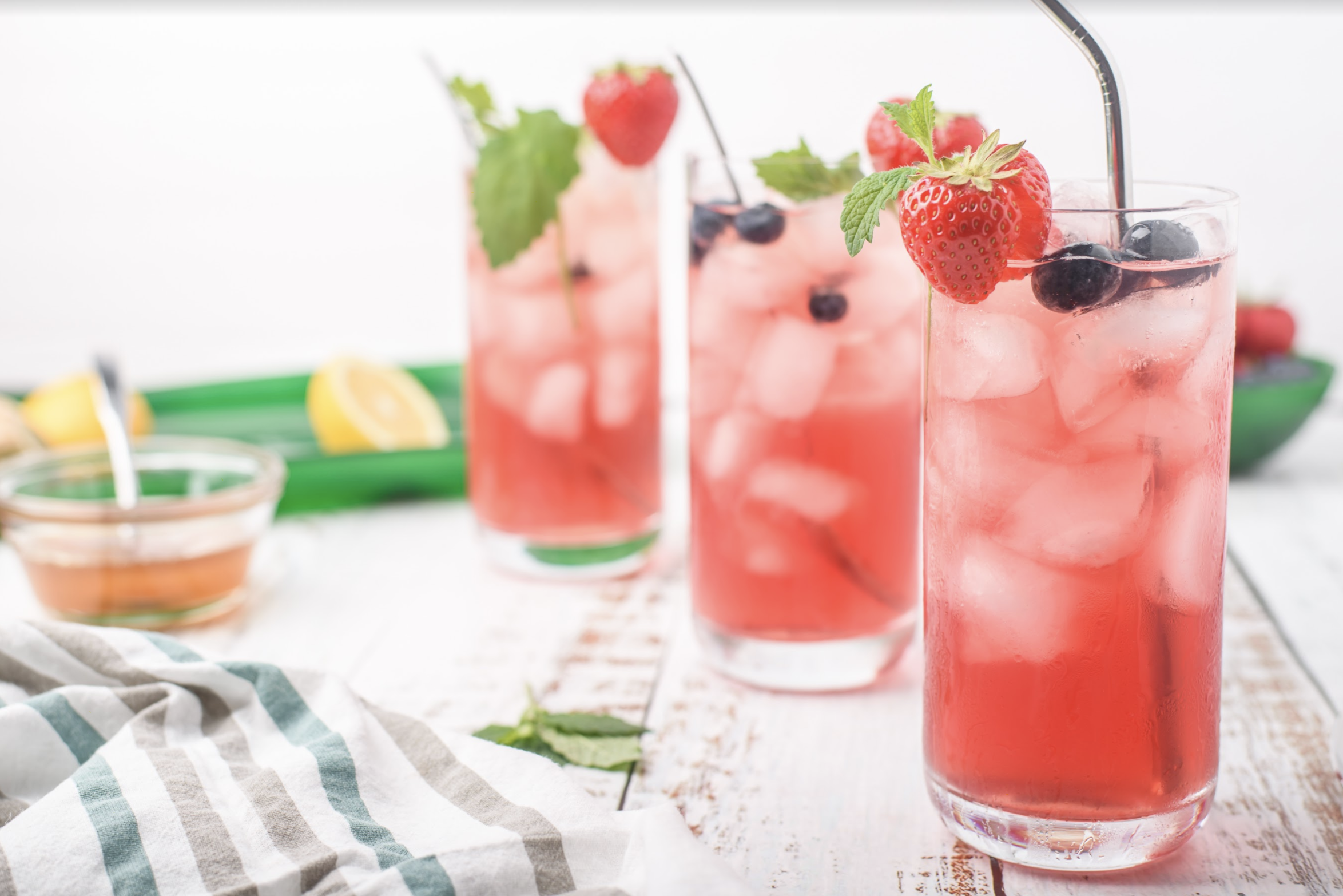 This tasty, refreshing and easy to make ginger mint berry iced tea is perfect for your next family barbecue or any get together this summer! #icedtea #summerdrink #berries #minttea #berrydrink #mintberry #strawberries #foodies #foodblogger #yummy