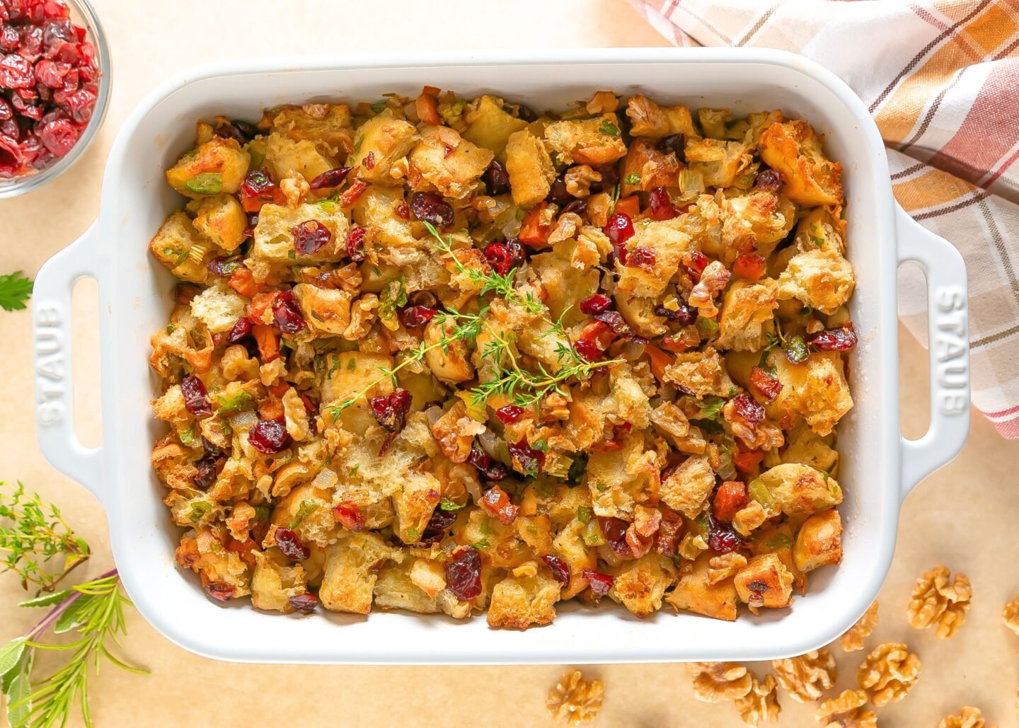 Classic Thanksgiving dressing baked with fresh herbs and rustic bread