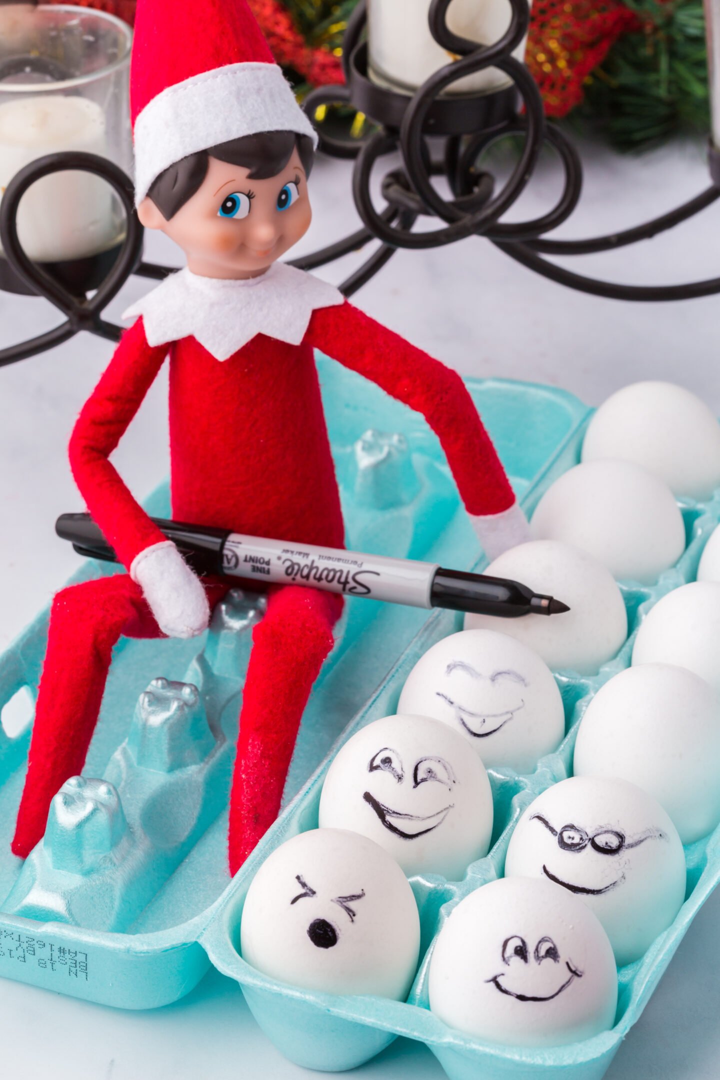 Elf on the Shelf drawing on eggs prank