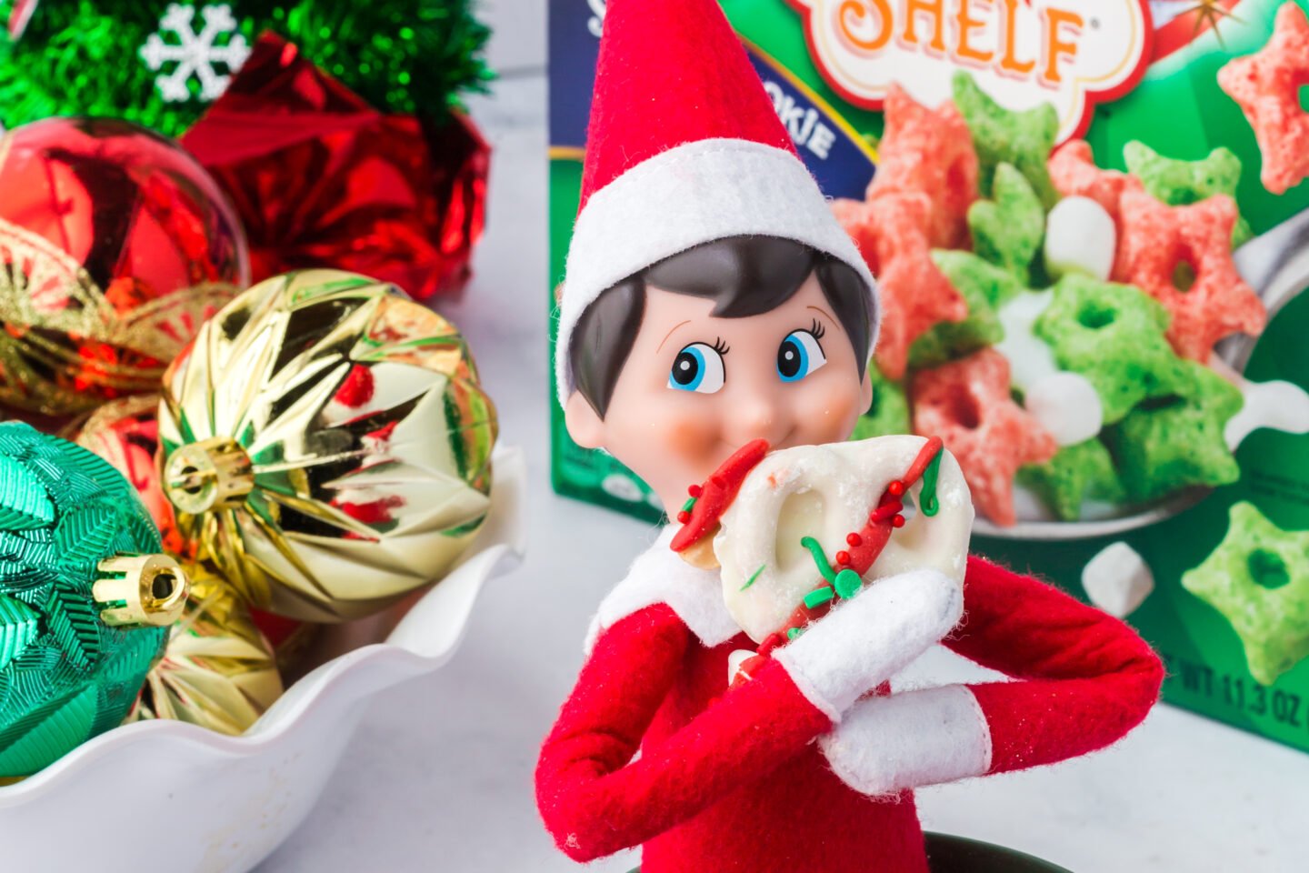 Elf on the Shelf excited for the Christmas snack mix 