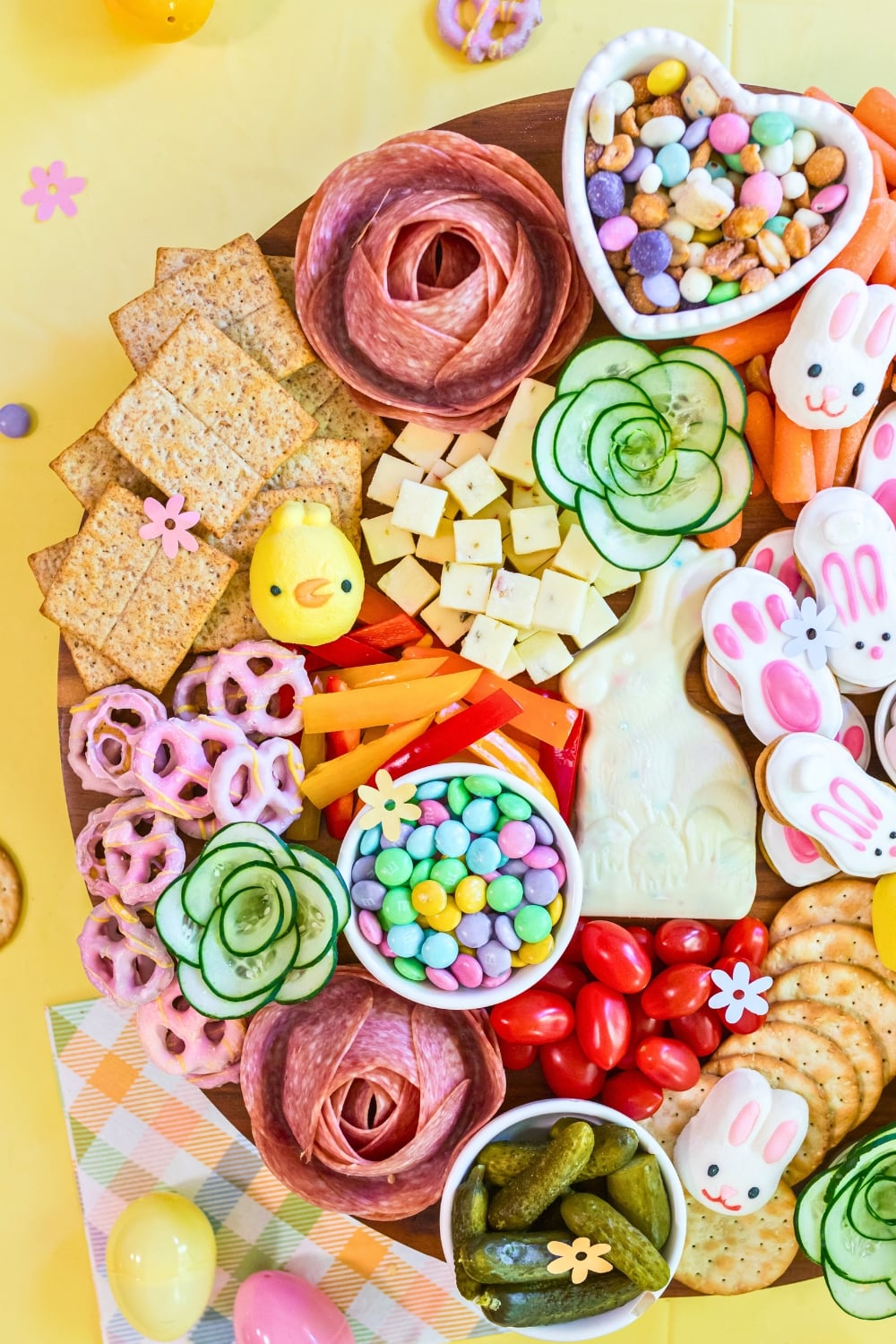 savory section with vegetables cheese cubes and crackers on Easter snack board