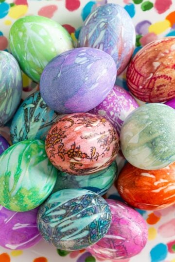 silk dyed eggs in a decorative bowl with colorful patterns for Easter