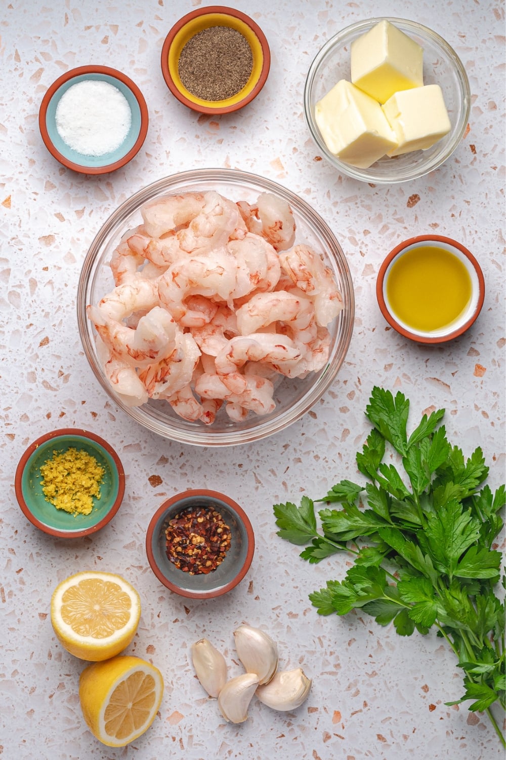 ingredients for garlic butter shrimp including shrimp garlic lemon butter parsley