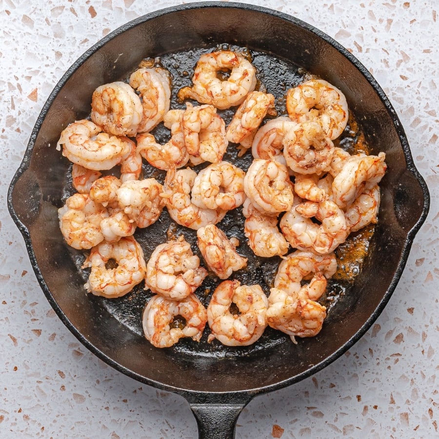shrimp searing in skillet until pink and opaque