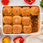 Finished baked Sloppy Joe casserole topped with golden buttery sesame slider buns