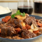 Beef bourguignon with mushrooms, pearl onions, and carrots in red wine sauce
