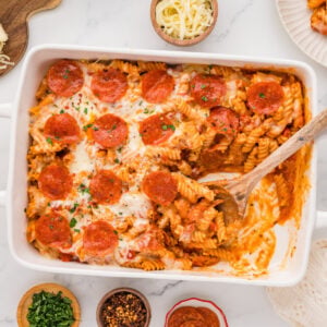 Pepperoni pizza casserole with rotini pasta, melted mozzarella, and crisp pepperoni slices.