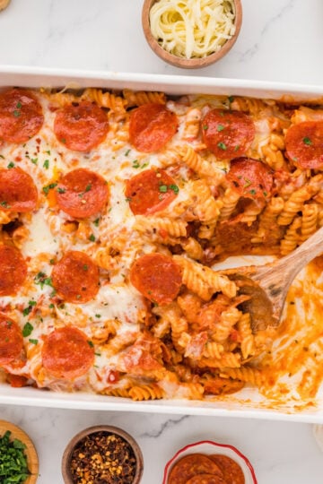 Pepperoni pizza casserole with rotini pasta, melted mozzarella, and crisp pepperoni slices.